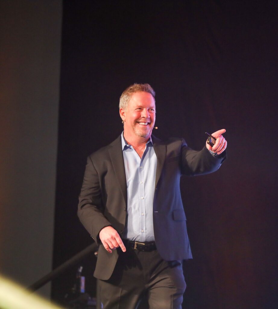 Scott Deming with attendees after a keynote
